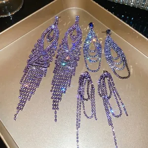 Elegant purple rhinestone tassel drop earrings set featuring cascading crystal geometric fringe