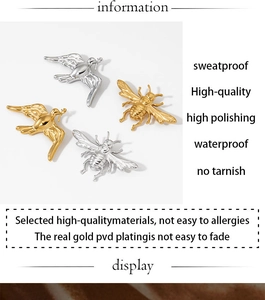 Detail view of bird and bee brooch with real gold PVD plating for anti-tarnish durability