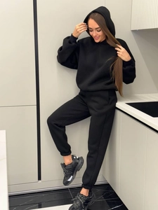 Women's black two-piece fleece hoodie and drawstring sweatpants loungewear set