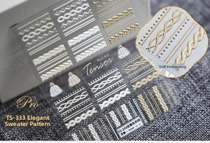 Macro detail of 3D embossed knitting patterns and mini hats on nail stickers TS-333