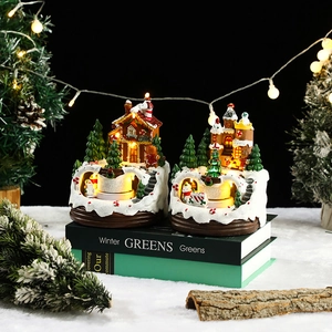 Luminous resin Christmas gingerbread house and castle ornaments with warm LED lights