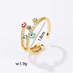 Golden evil eye open ring with multicolored zircon accents and measurements shown