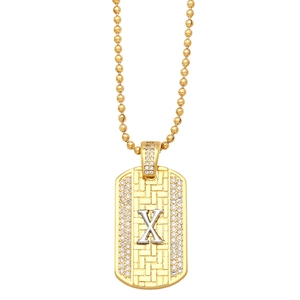 Detail of gold and silver rectangular X pendant with pavé crystals on bead chain