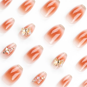 Brown ombre press-on nails with 3D butterfly, floral accents, and aurora glitter tips