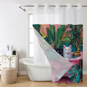 Detail of bathroom shower curtain featuring three cats in a pink tub with tropical leaves