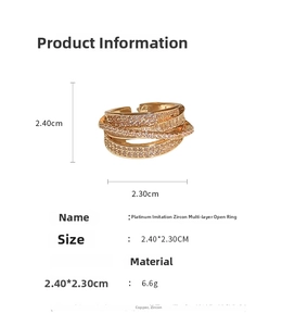 Detailed specs of multi-layer gold ring with cubic zirconia on white background