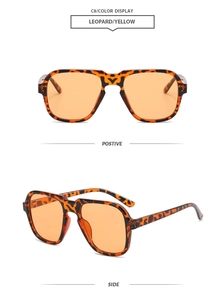 Detail view of leopard print aviator sunglasses with vibrant yellow tinted lenses