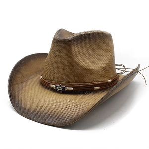 Vintage gradient brown woven straw cowboy hat with ethnic evil eye metal accessory