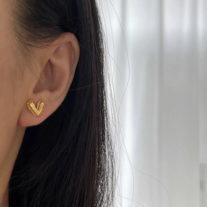 Elegant gold heart-shaped stud earrings featuring a V-shaped design for women