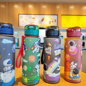 Detail of four colorful 700ml astronaut water bottles with portable straps on wood desk
