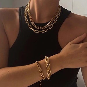 Chunky 18k gold plated Cuban chain necklace and bracelet set for a minimalist retro look