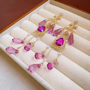 Vintage gold tassel drop earrings with purple crystals and pearls for a classic look