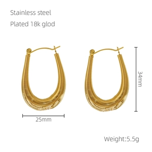 Macro view of U-shaped spiral earrings with 18K gold plating and 34mm height