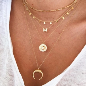Layered 925 sterling silver gold necklace with letter M, sun and crescent horn pendants