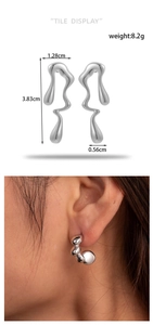 Detailed view of silver liquid metal style earrings with weight and size measurements
