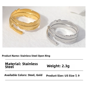 Detailed view of feather patterned stainless steel open ring with weight and size specs