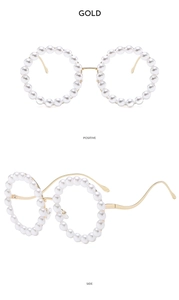 Detail of round sunglasses with white pearls and curved golden metal temples