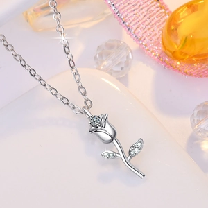 Vintage rose flower necklace in silver finish with micro-set zircons on a cross chain