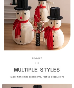 Close-up of cream honeycomb paper snowman ornament with red scarf and black top hat