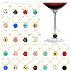 Detailed grid view of colorful A-Z enamel letter charms for DIY wine glass identifiers