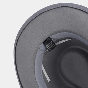 Detail of the gray fedora interior showing 65% cotton fabric label and quality stitching