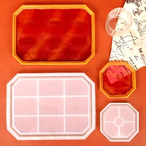 Detail of DIY Chinese style resin silicone mold kit with red and gold glitter finished trays