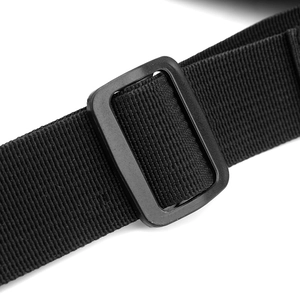 Detail shot of the durable black nylon strap and adjustable plastic buckle on the tactical vest bag