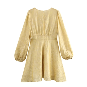Robe élégante jaune pâle à col en V avec manches lanternes et fermeture éclair