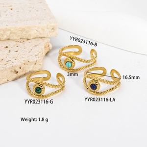 Detailed view of adjustable 18K gold plated stainless steel rings with natural stone insets