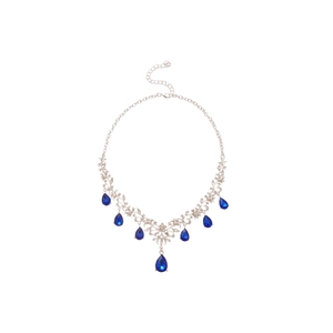 Silver necklace set with blue teardrop crystals and floral rhinestones on white background