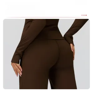 Detail showing the ergonomic lifting design and dense stretch fabric of brown leggings