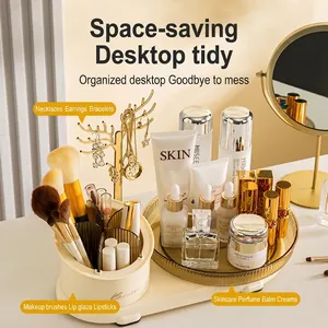 Rotating desktop cosmetic organizer tray with amber dividers and golden antler jewelry rack