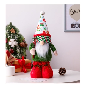Detail of blue sequin Christmas gnome decoration with festive hat and ski poles