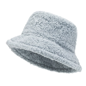 Close-up of light grey-blue fluffy corduroy bucket hat showing soft fuzzy texture