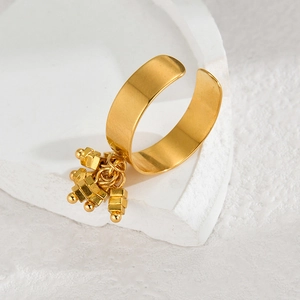 Gold plated stainless steel open ring with hanging geometric cubes and beads pendants