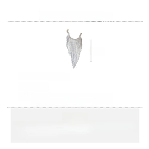 Detail view of silver tassel necklace with rhinestones and size measurements