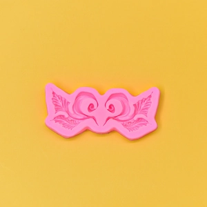 Pink silicone fondant mold featuring European relief leaf patterns for cake decoration