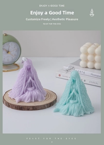 Detailed view of female-shaped scented candles in purple and teal for home decor