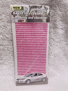 Macro shot of 3mm pink acrylic crystal rhinestone sticker sheet for DIY car decoration