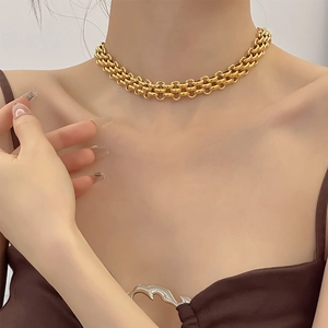 Double-layered chunky gold chain choker necklace in stainless steel on model neck