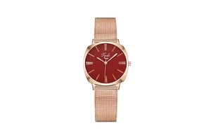 Detail of rose gold mesh band watch with red dial and crystal hour markers
