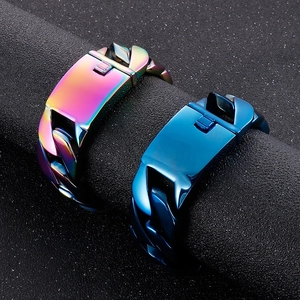 Detail of 26mm wide Cuban link bracelet in iridescent and blue plated stainless steel