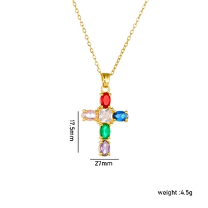 Gold cross necklace featuring colorful gemstones and dimensions of 17.5mm x 27mm