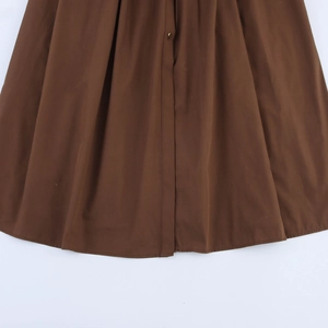 Elegant sleeveless brown maxi dress with pleated placket and stylish metal button detail