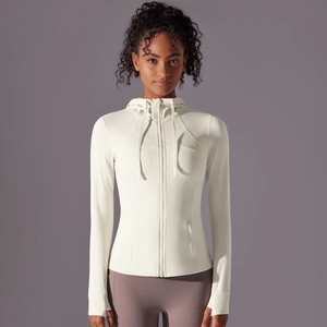 Detailed view of women's hooded sports jacket with zipper and thumbhole cuffs