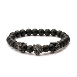 Men's matte volcanic stone bracelet featuring a micro-paved leopard head and crown beads