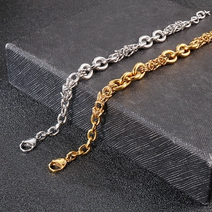 Close-up of Byzantine style stainless steel dragon scale bracelets in gold and silver