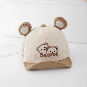 Detailed close-up of baby mesh sun hat with cute bear ears and breathable fabric
