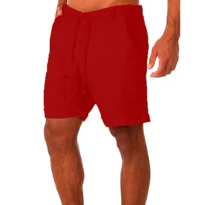 Detailed macro view of red cotton linen men's shorts with drawstring waist and pockets