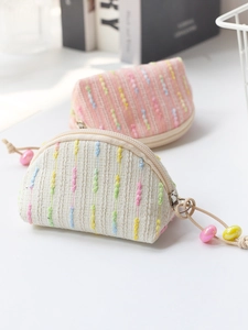 Mini striped knit coin purses for headphones and lipstick storage in beige and pink